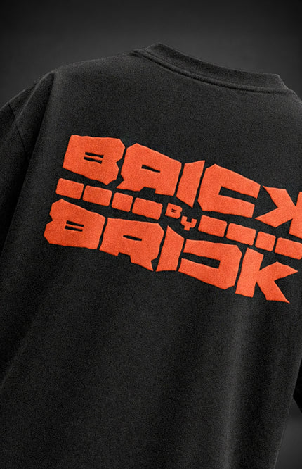 GRAPHIC PRINT STREETWEAR T-SHIRT - BRICK BY BRICK